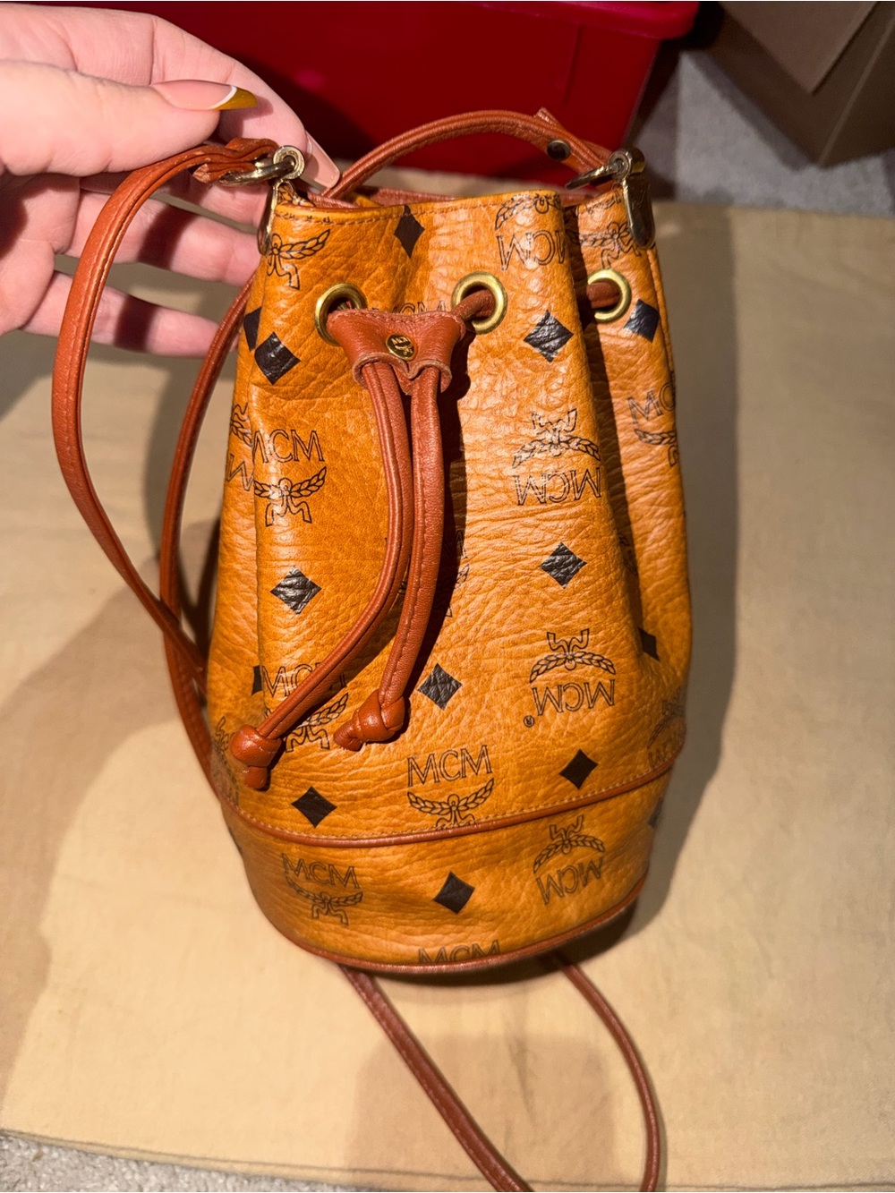 MCM Visetos Mini Drawstring Bucket Bag in Cognac